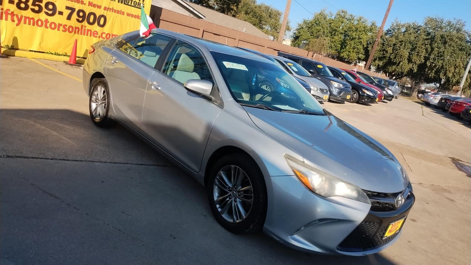 2015 Toyota Camry (4T1BF1FK4FU) , located at 16710 Clay Rd., Houston, TX, 77084, (281) 859-7900, 29.834864, -95.656166 - Photo#2